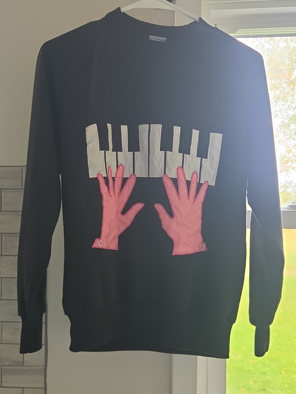 Vintage Women's Graphic Piano Sweater with Pink Gloves